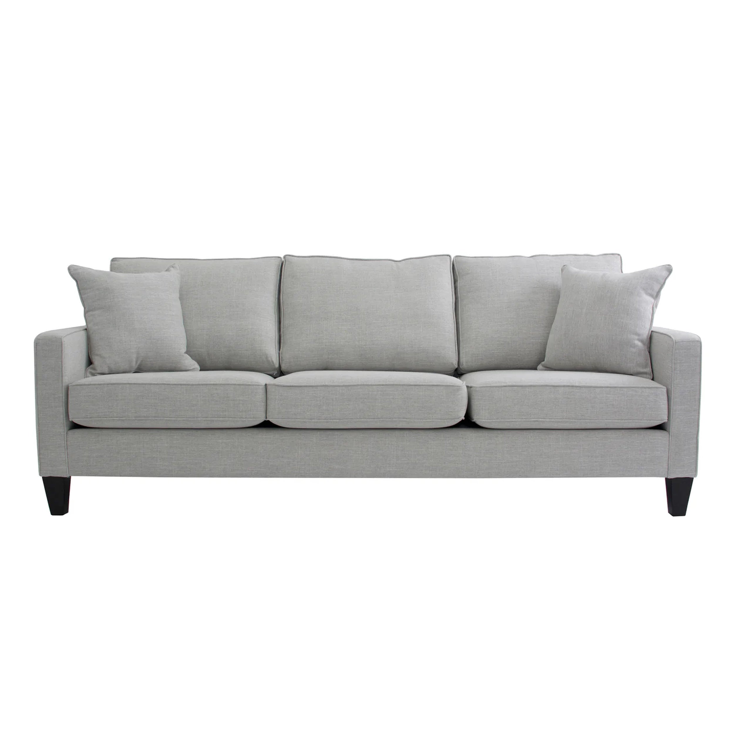 Monroe sofa with four cushions on a white background