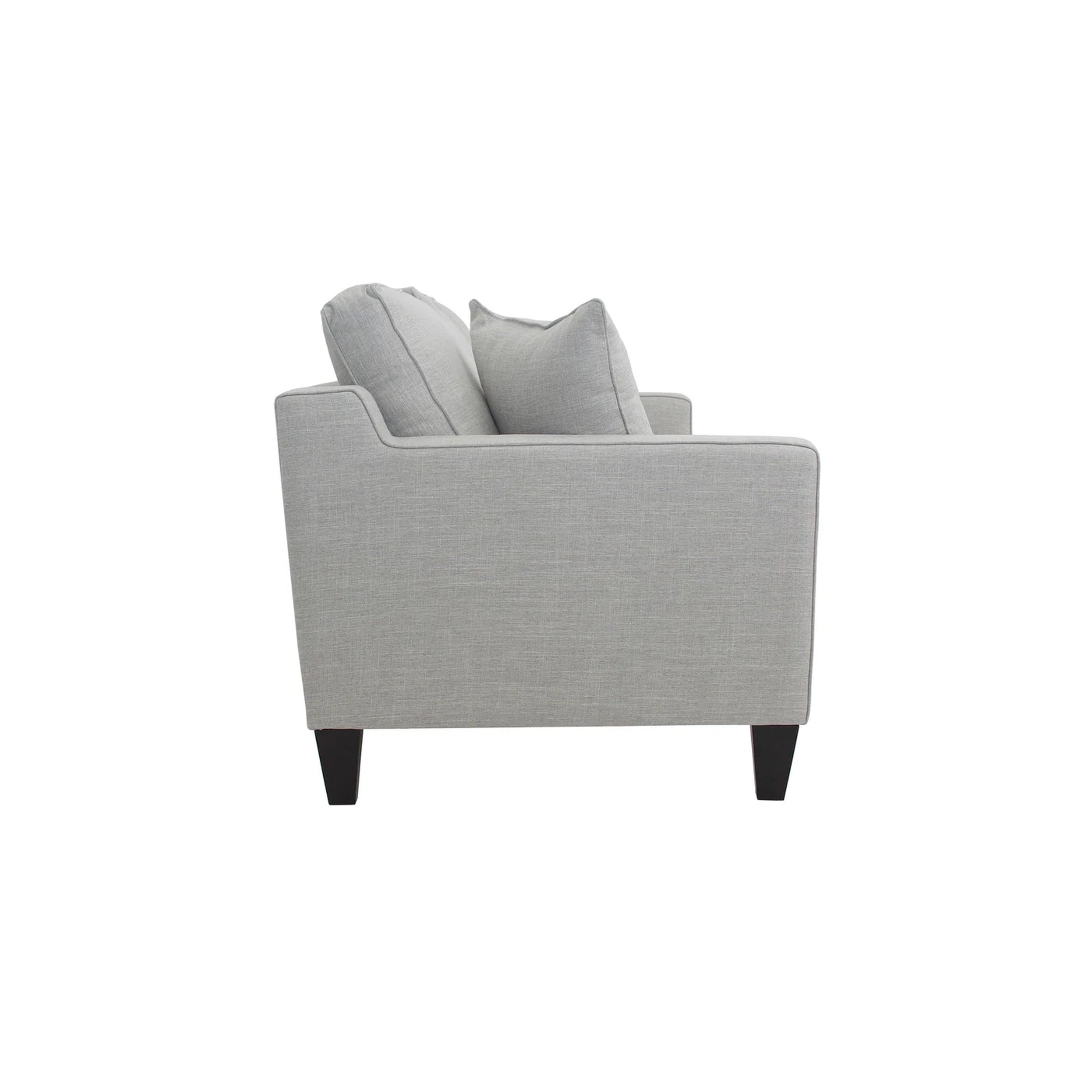Gray sofa with black legs on a white background