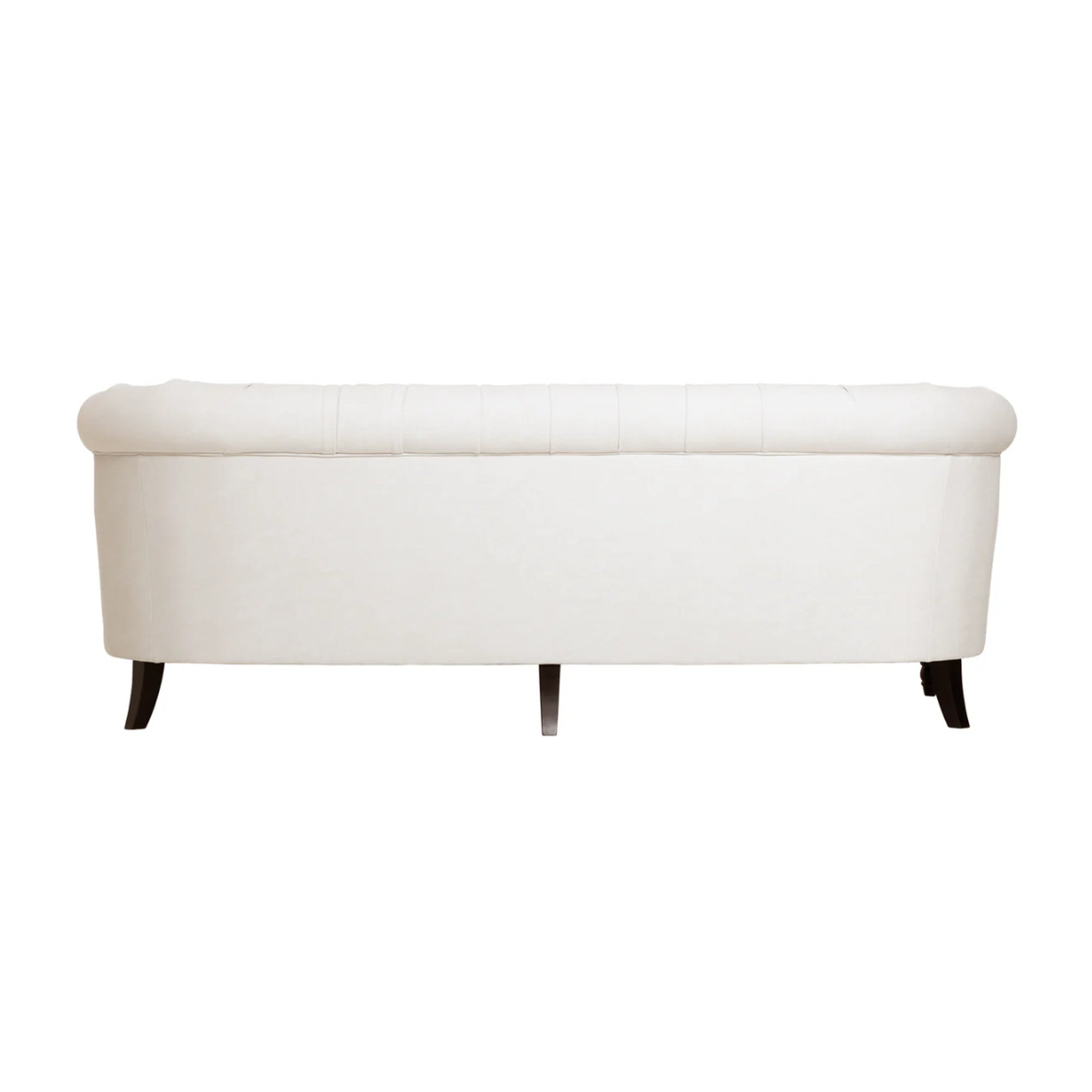 White upholstered sofa showing the back on a white background