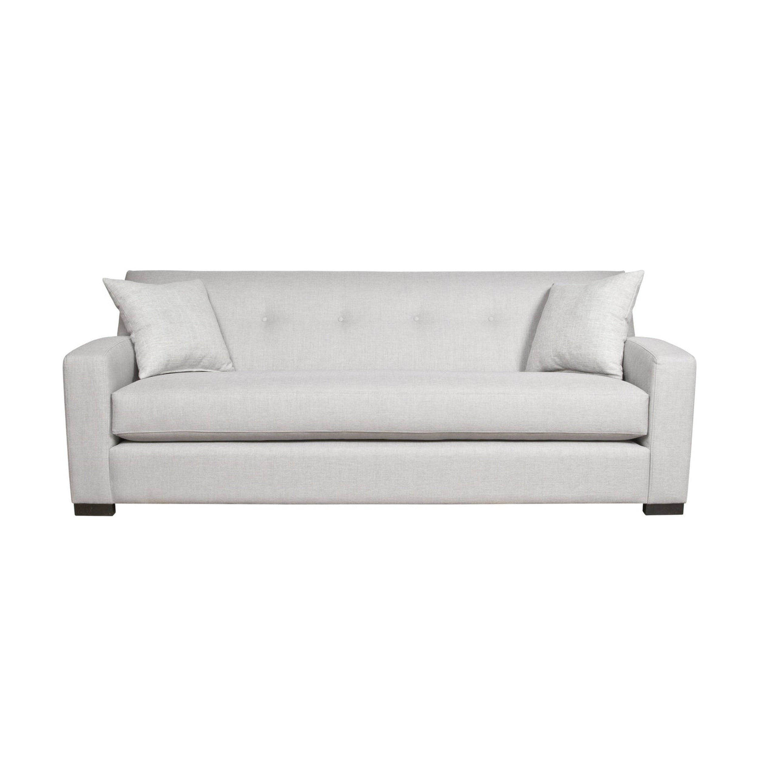 Gray sofa with two cushions on a white background