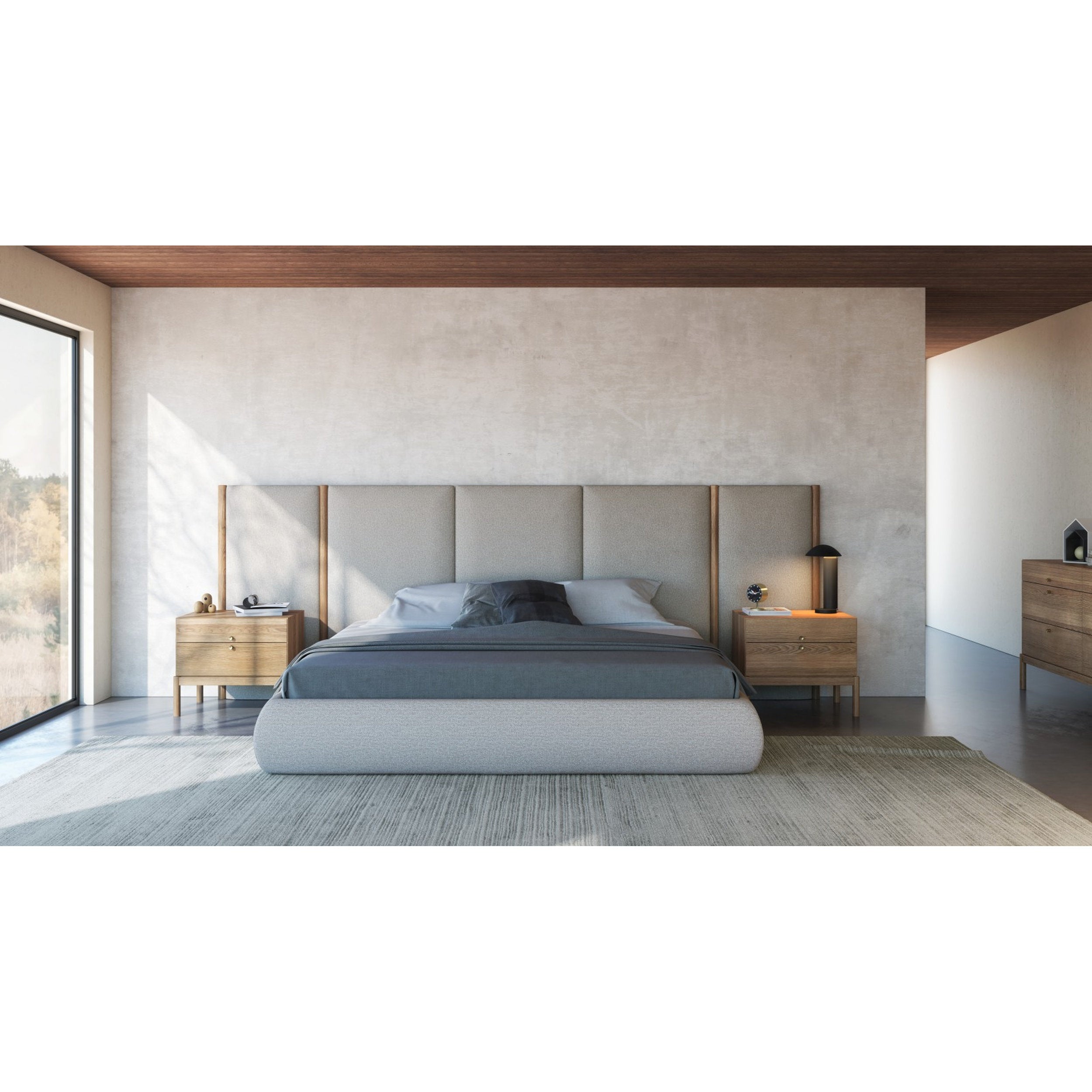 Lawrence King In Store Set by Huppe with beige fabric headboard, oak frame, blue gray bedding, nightstands, minimal space.