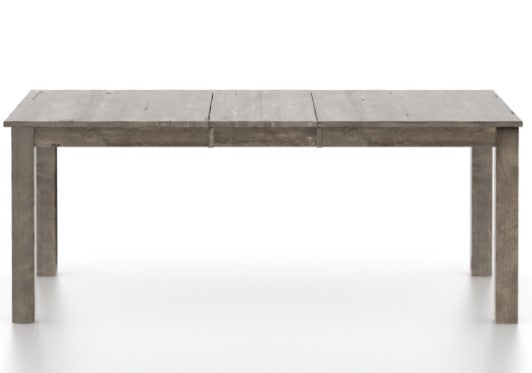 A rectangular wood top table with a distressed finish